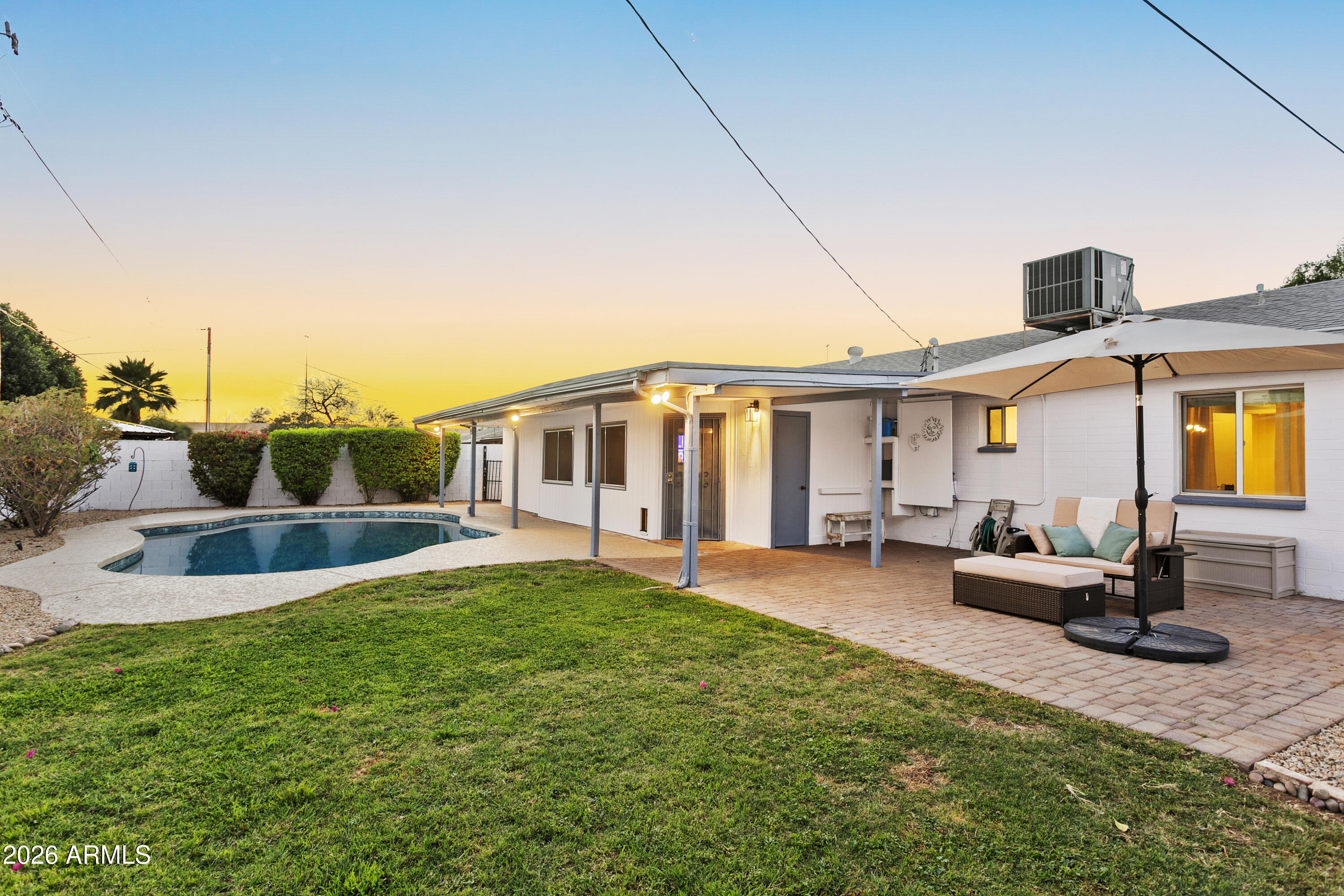 3445 East Thunderbird Road Phoenix, AZ 85032 - Photo 33 of 35 a view of a house with a patio