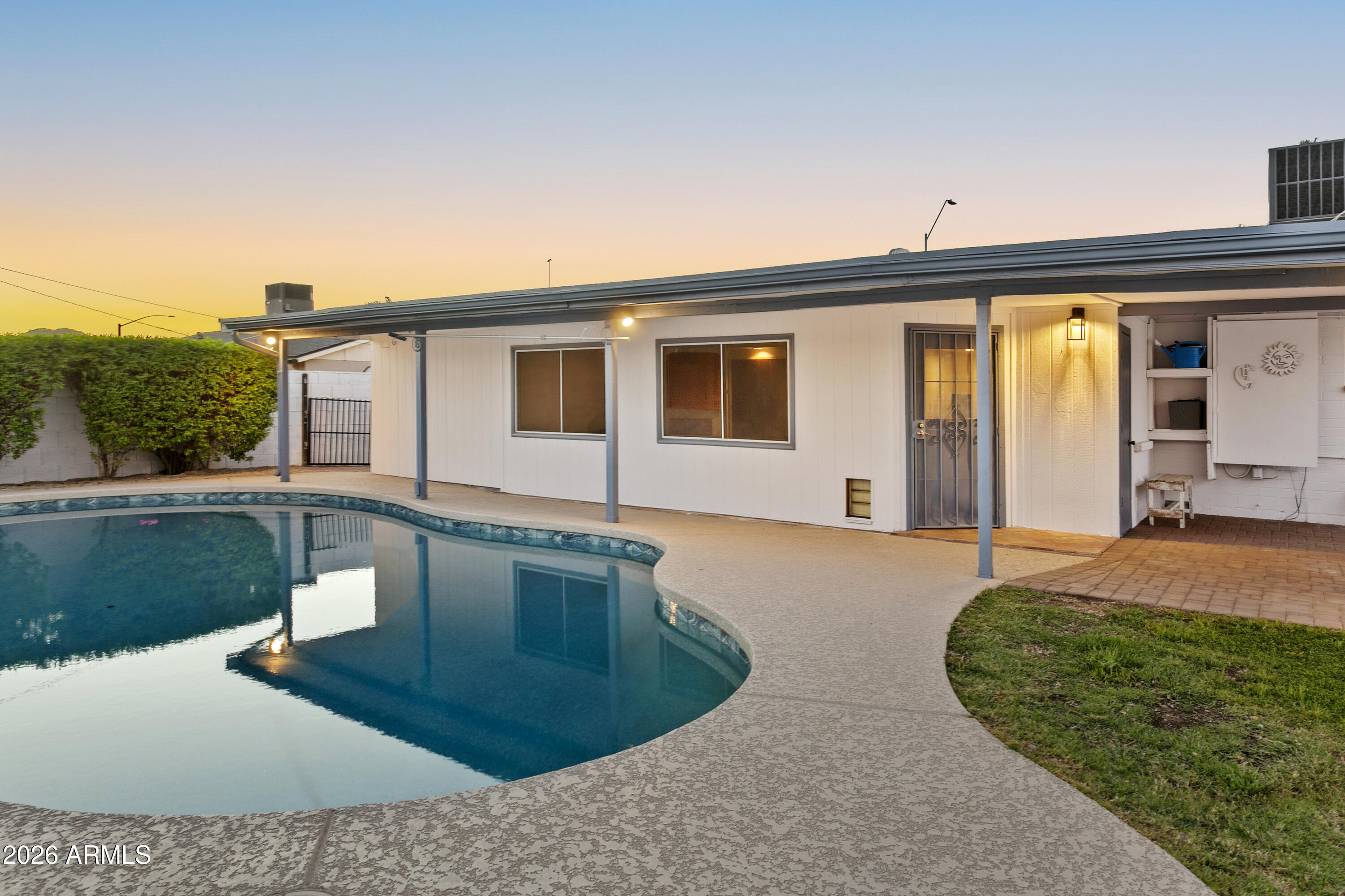 3445 East Thunderbird Road Phoenix, AZ 85032 - Photo 34 of 35 a view of a house with backyard and porch