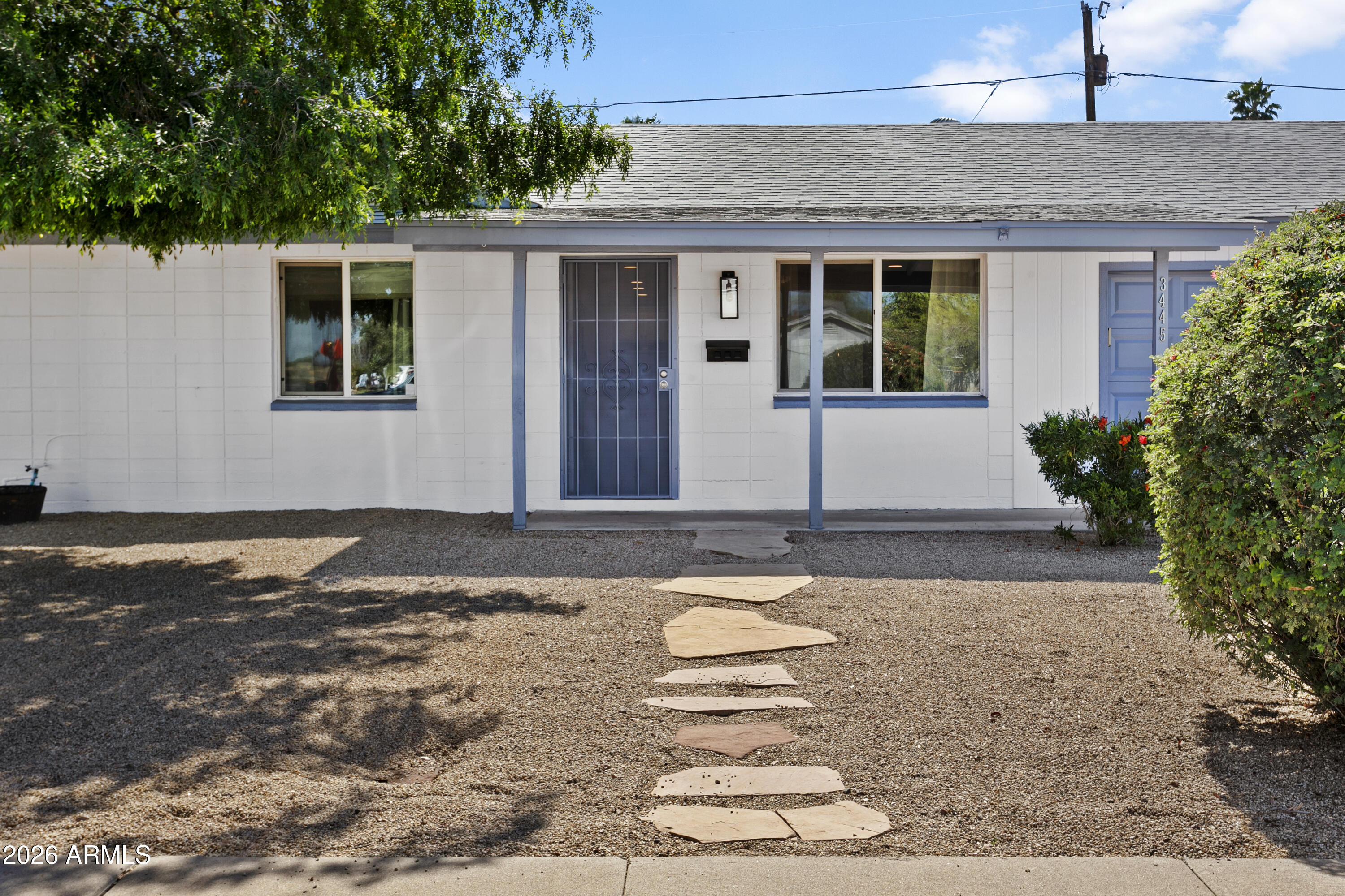 3445 East Thunderbird Road Phoenix, AZ 85032 - Photo 4 of 35 a front view of a house