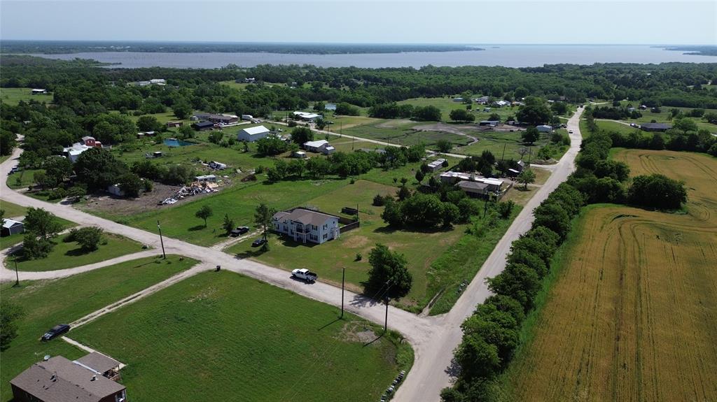 Tbd Telegraph Road Quinlan, TX 75474 - Photo 13 of 14 an aerial view of a house with a yard and lake view