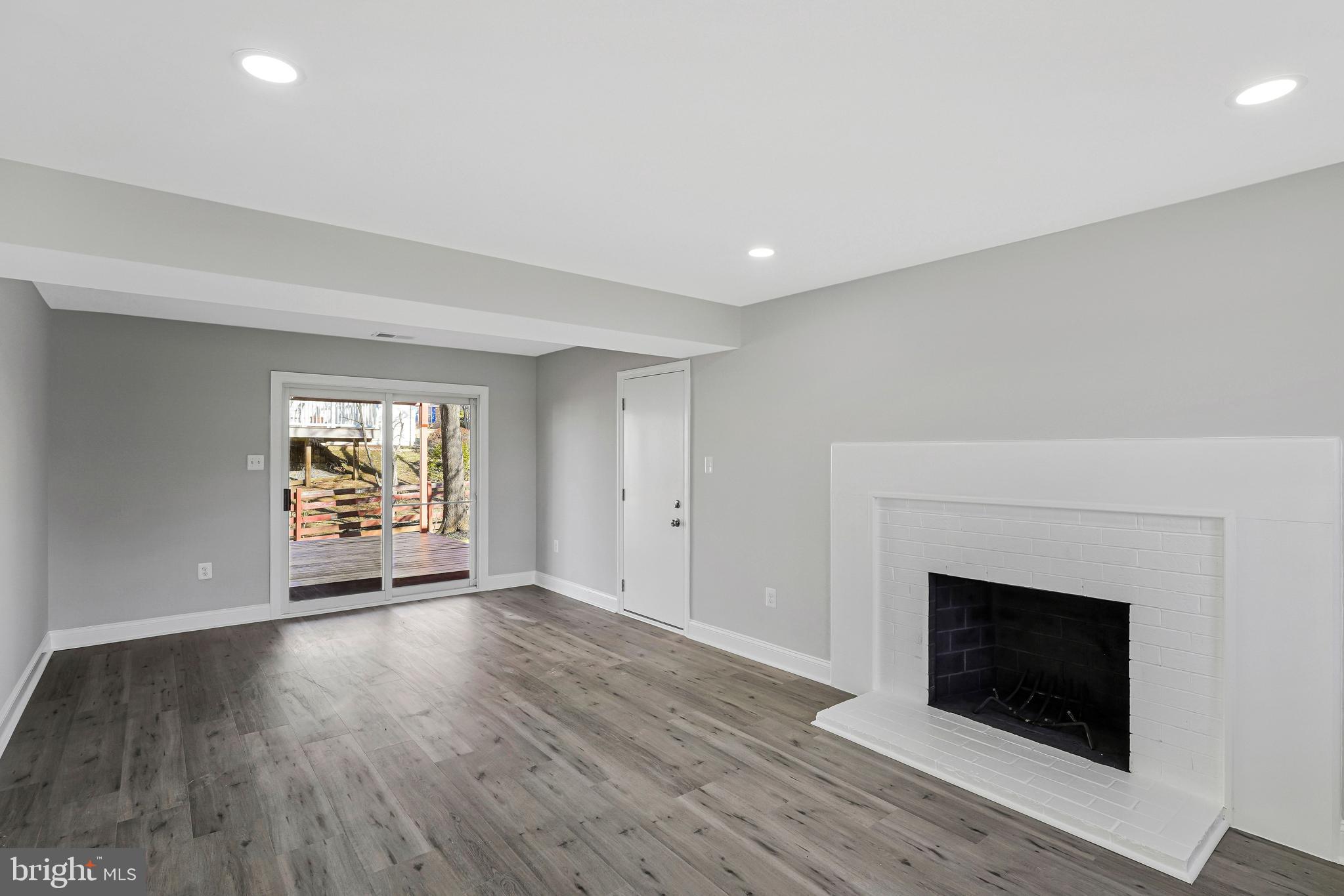 12016 Trossack Road Herndon, VA 20170 - Photo 16 of 29 Walk Out Basement with Wood Fireplace