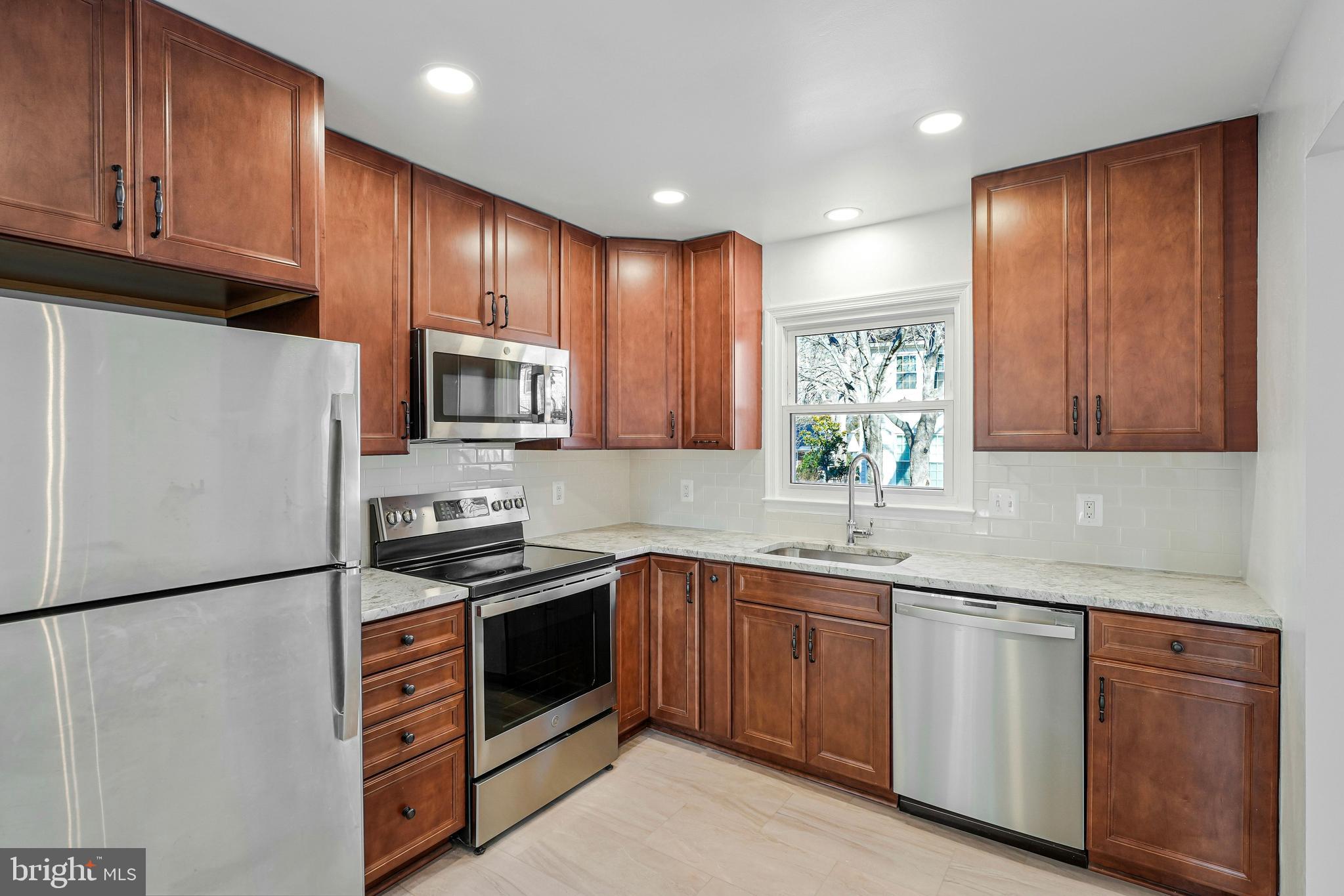 12016 Trossack Road Herndon, VA 20170 - Photo 2 of 29 Updated Maple Cabinets