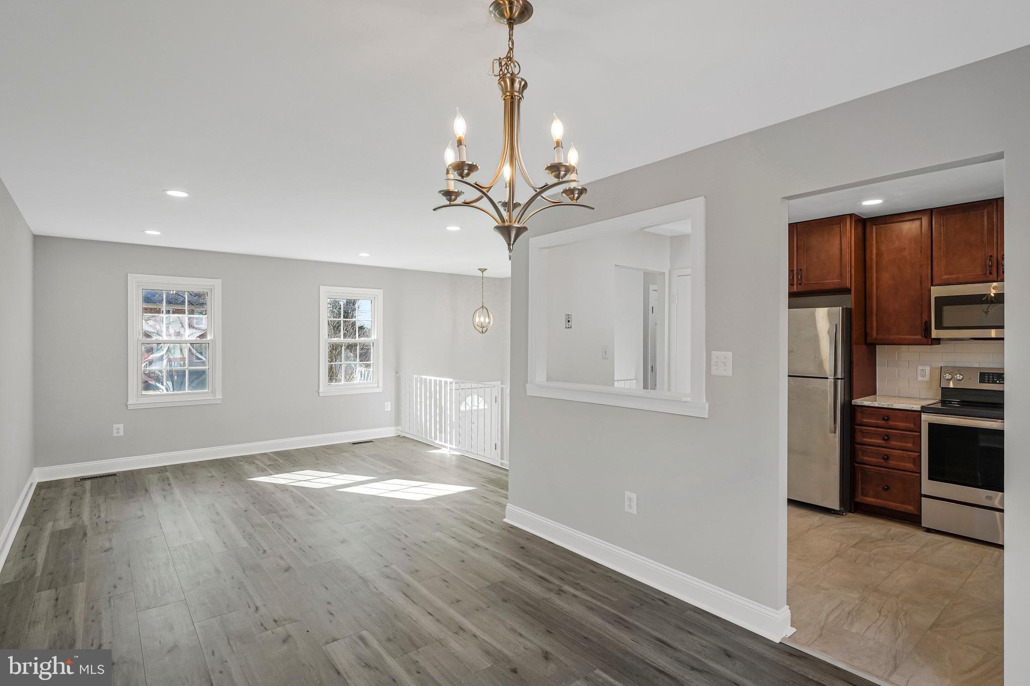 12016 Trossack Road Herndon, VA 20170 - Photo 8 of 29 Living Room & Dining Room Combo