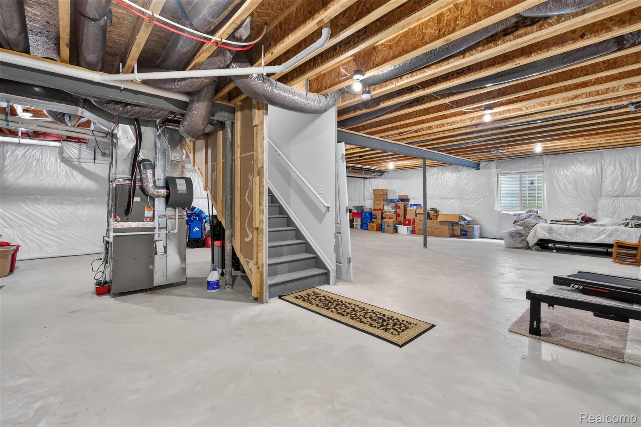 4795 Bingham Road Canton, MI 48188 - Photo 36 of 50 Expansive, dry unfinished basement awaiting your ideas. Egress window already in place!