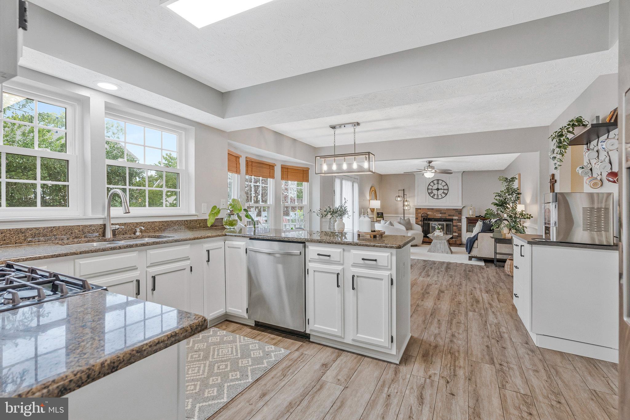 1204 James Rifle Court Northeast Leesburg, VA 20176 - Photo 14 of 51 a kitchen with stainless steel appliances granite countertop a stove and a sink