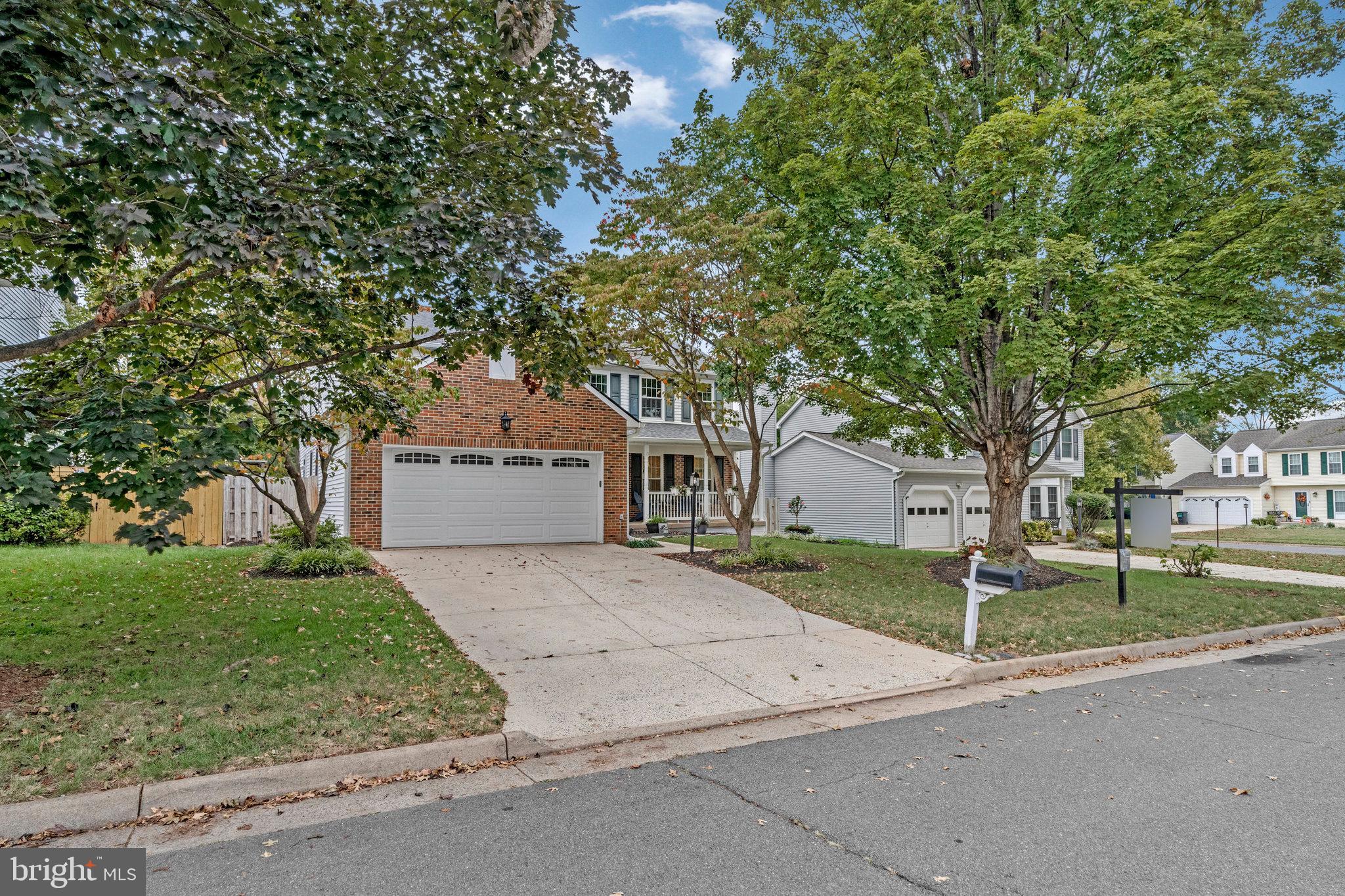 1204 James Rifle Court Northeast Leesburg, VA 20176 - Photo 2 of 51 front view of a house with a yard
