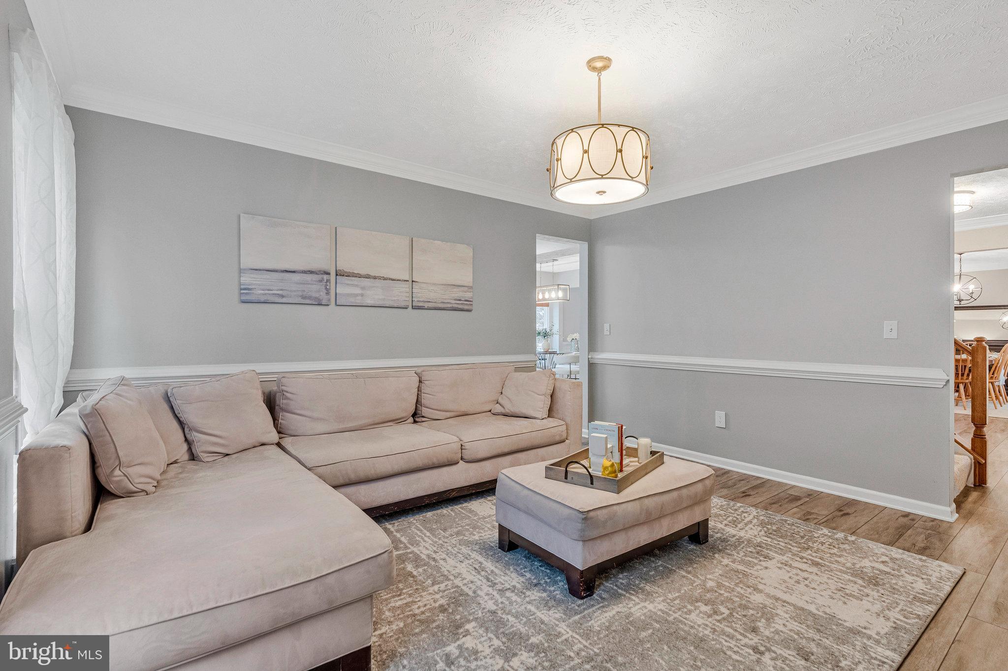 1204 James Rifle Court Northeast Leesburg, VA 20176 - Photo 21 of 51 a living room with furniture and a rug