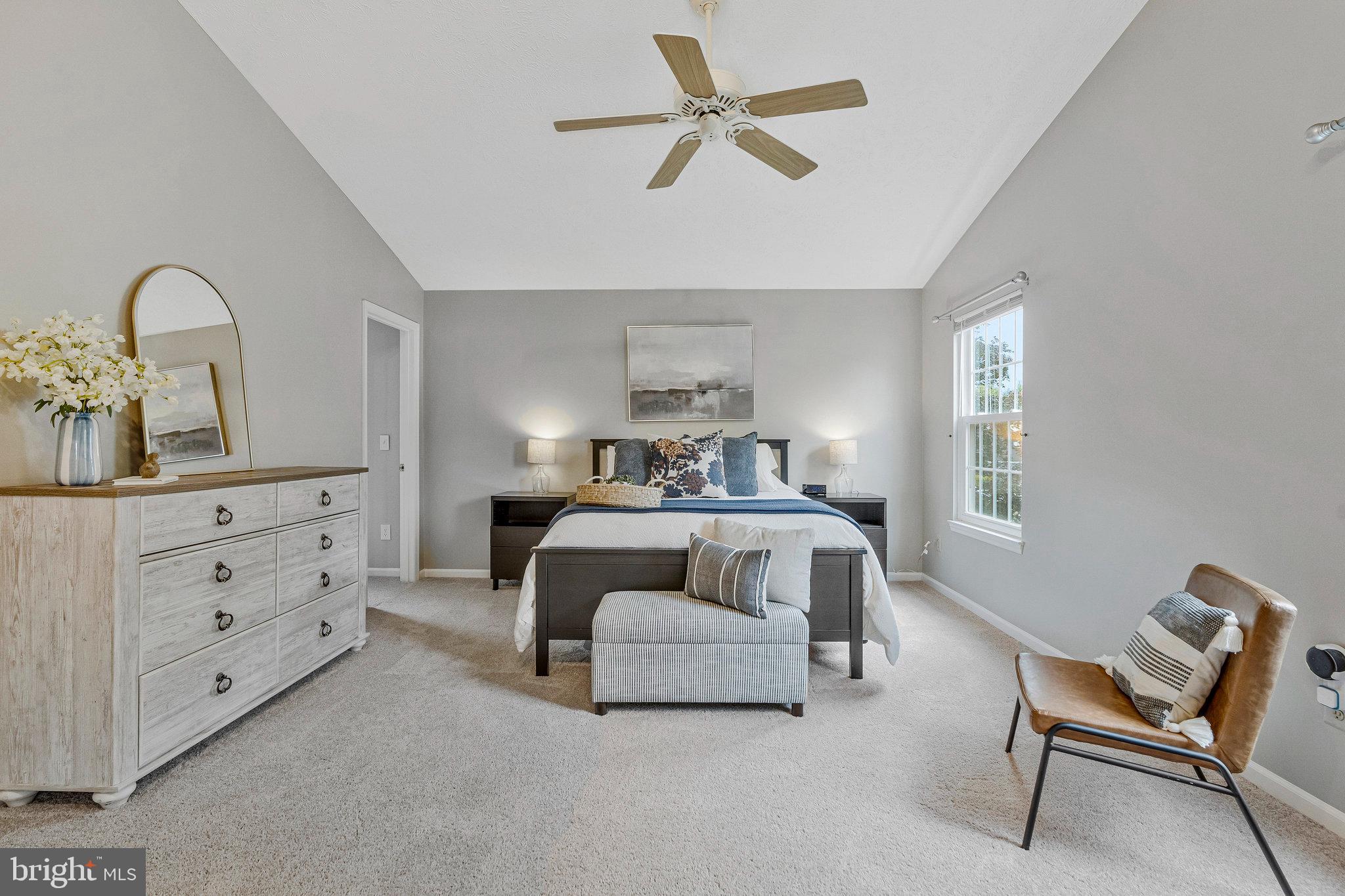 1204 James Rifle Court Northeast Leesburg, VA 20176 - Photo 24 of 51 a bedroom with a bed and a dresser
