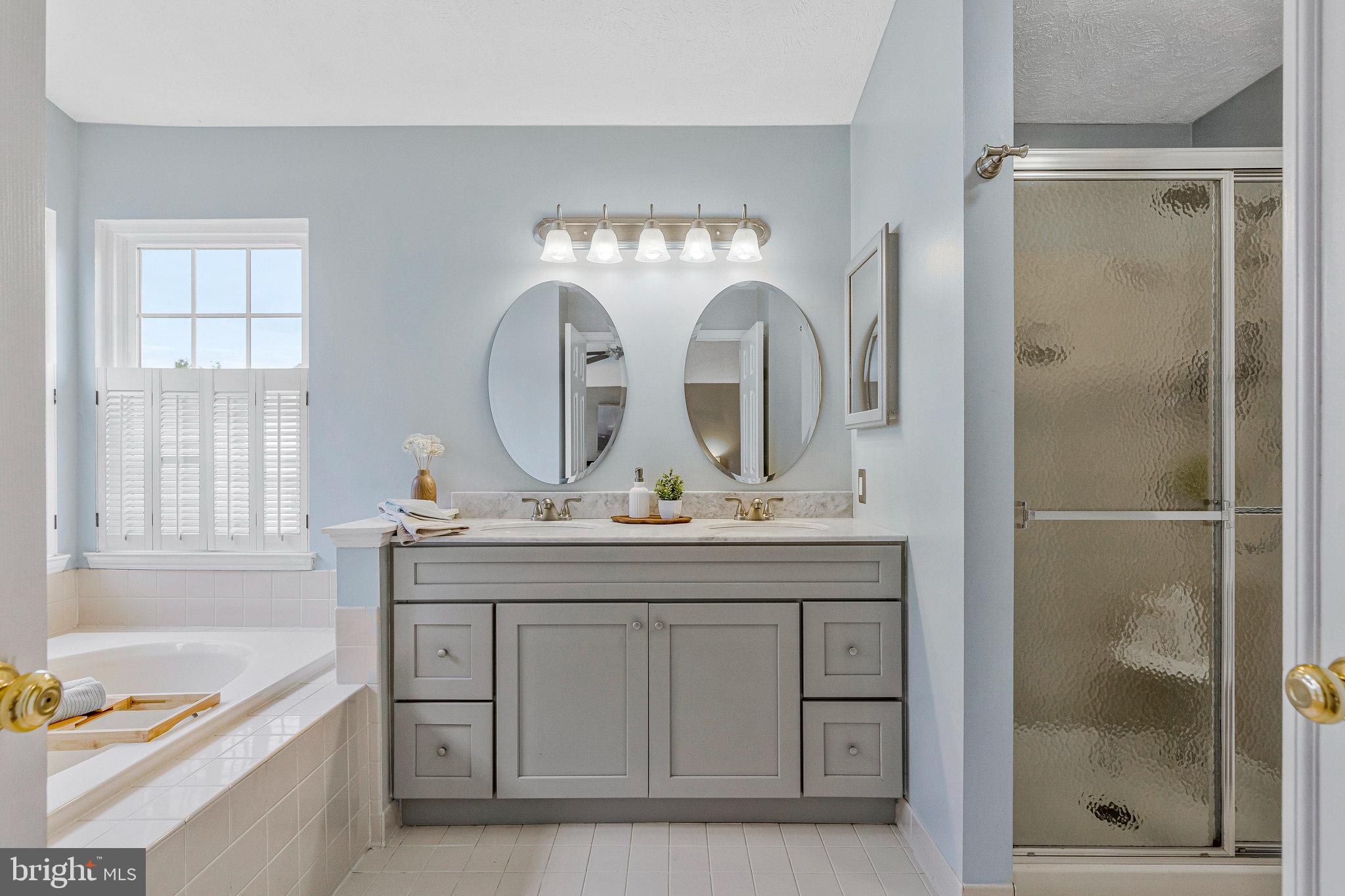 1204 James Rifle Court Northeast Leesburg, VA 20176 - Photo 28 of 51 a view of bathroom with dual sinks