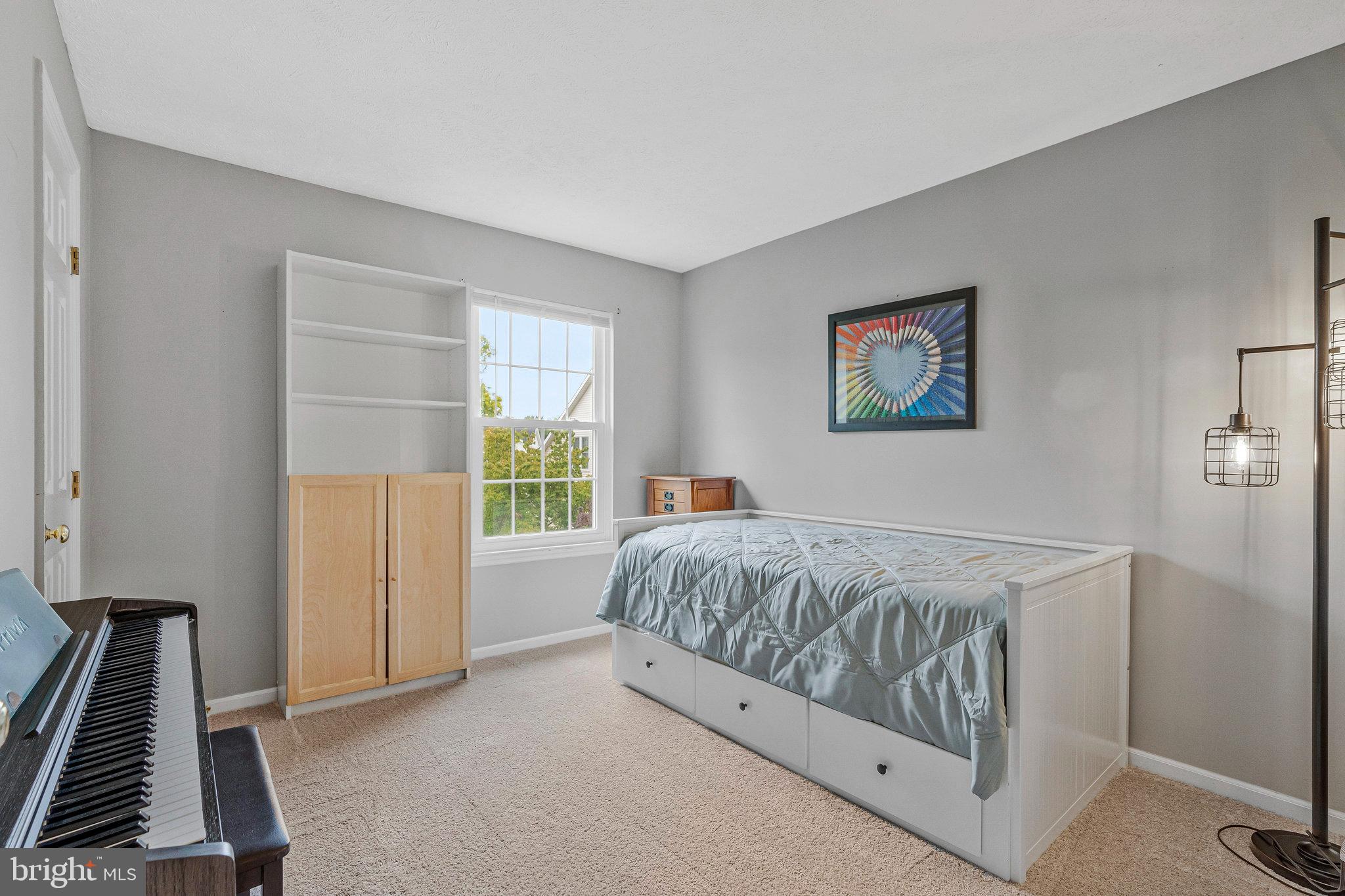 1204 James Rifle Court Northeast Leesburg, VA 20176 - Photo 31 of 51 a bedroom with a bed and a window