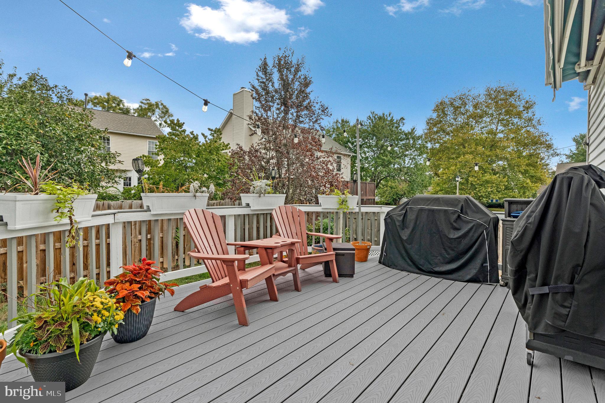 1204 James Rifle Court Northeast Leesburg, VA 20176 - Photo 45 of 51 a view of a chair and tables on the roof deck