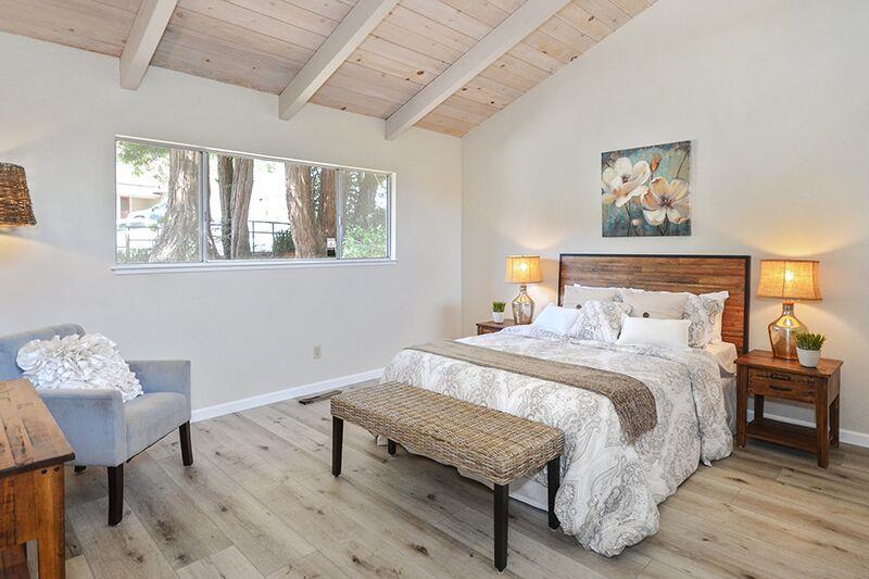 1728 Cheryl Way Aptos, CA 95003 - Photo 12 of 25 a bedroom with a bed a table and chair