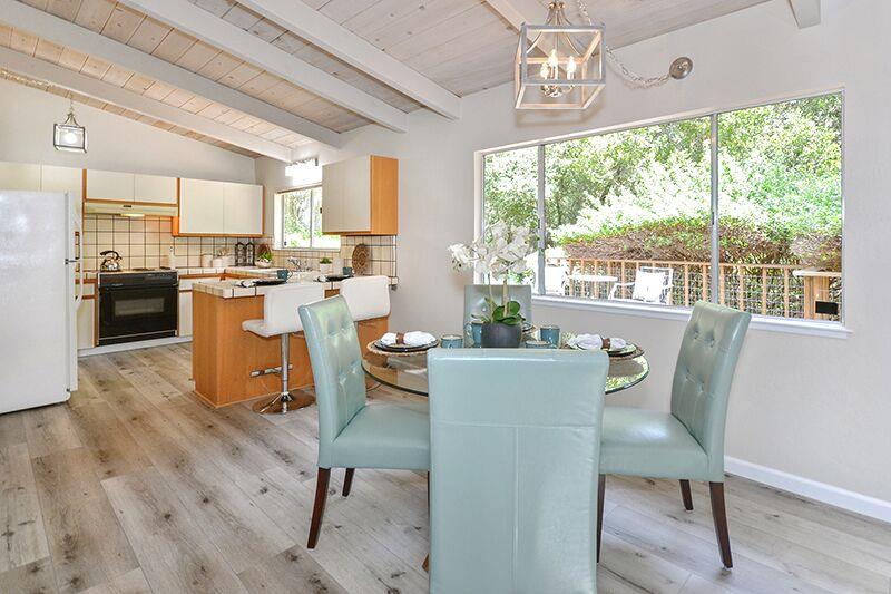 1728 Cheryl Way Aptos, CA 95003 - Photo 8 of 25 a dining room with furniture a chandelier and wooden floor