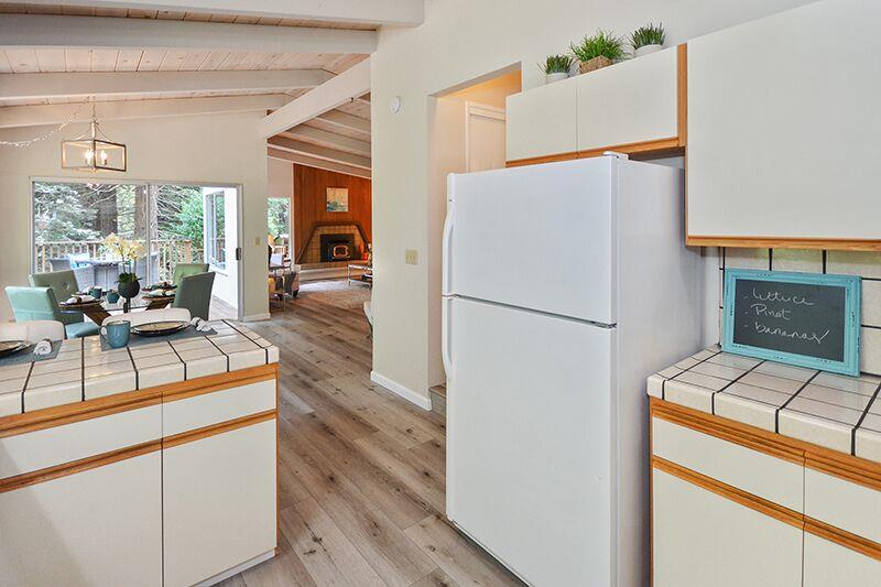 1728 Cheryl Way Aptos, CA 95003 - Photo 10 of 25 a kitchen with a refrigerator and a stove top oven