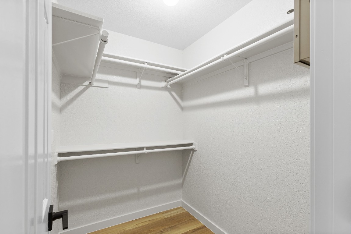 520 Hunter Ridge Road San Marcos, TX 78666 - Photo 11 of 27 a view of walk in closet with empty racks