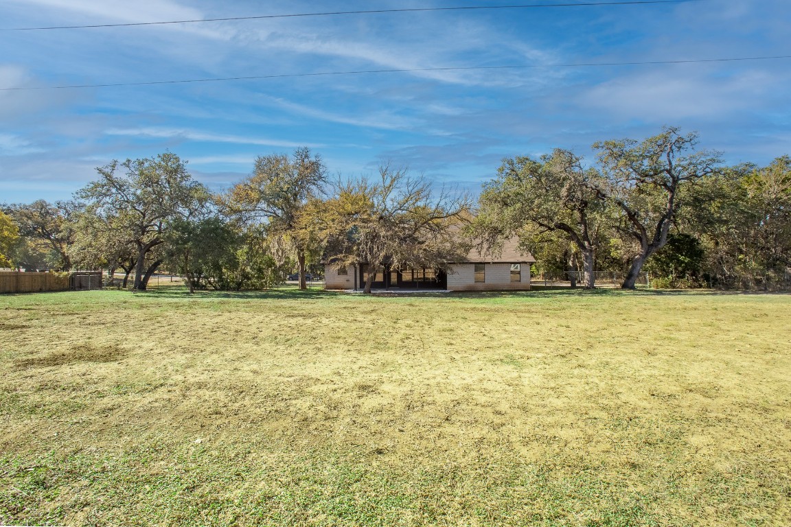 520 Hunter Ridge Road San Marcos, TX 78666 - Photo 23 of 27 a view of yard with trees