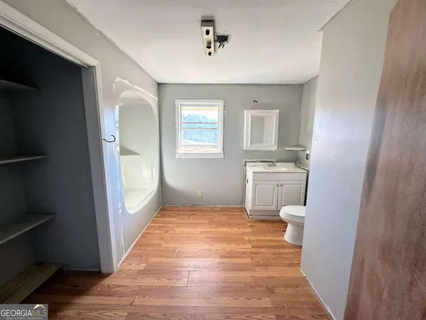 a view of an empty room and window