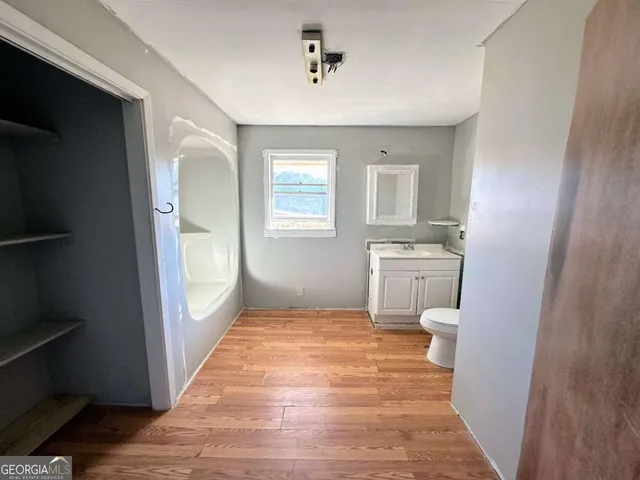 a view of an empty room and window