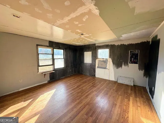 a view of an empty room and window