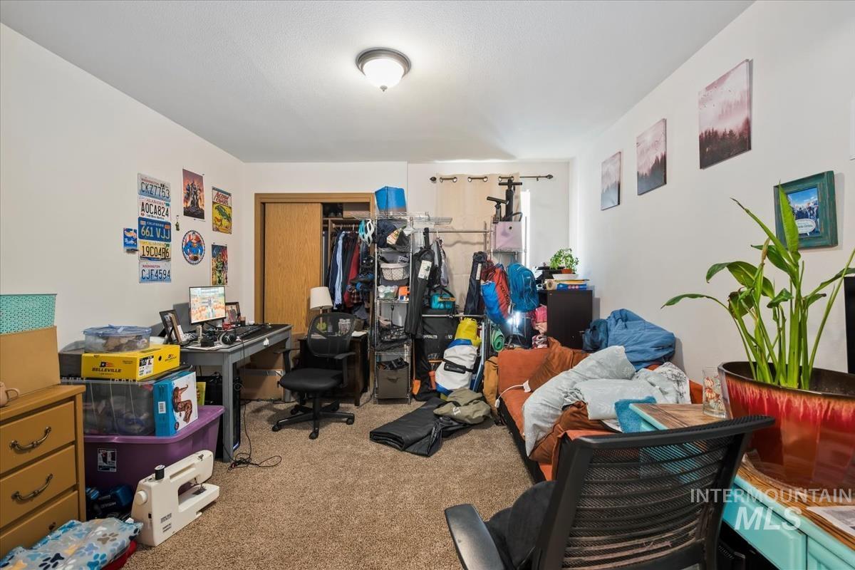 33 South Mike Street Boise, ID 83705 - Photo 20 of 50 Carpeted bedroom featuring a closet