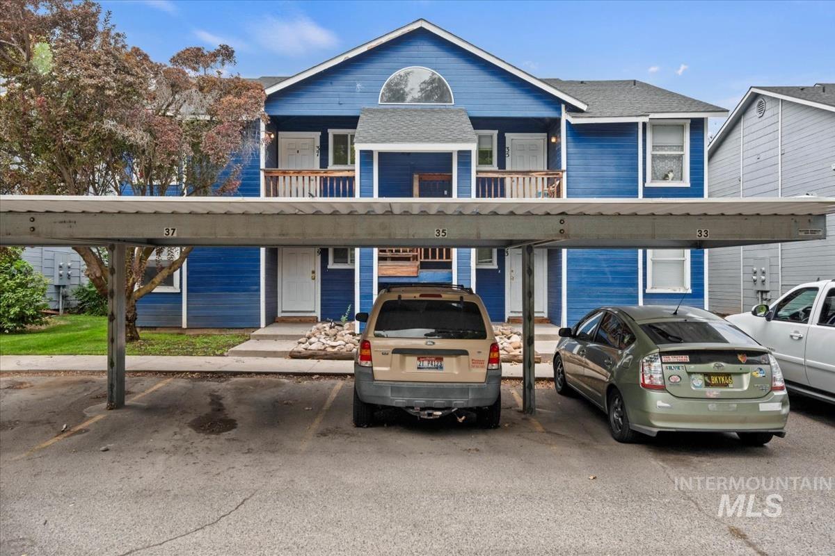 33 South Mike Street Boise, ID 83705 - Photo 2 of 50 View of front of property featuring covered parking and a balcony