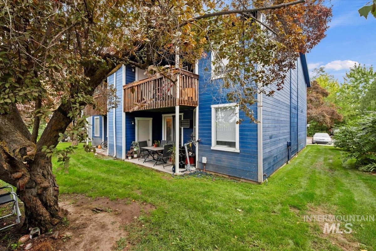 33 South Mike Street Boise, ID 83705 - Photo 49 of 50 Back of house featuring a yard, a patio area, and a deck