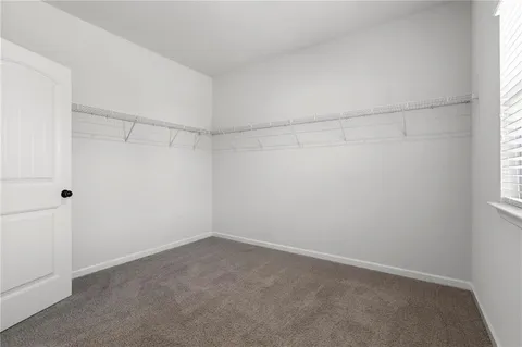 a view of a room with racks on the wall