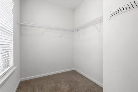 a view of a room with racks on the wall