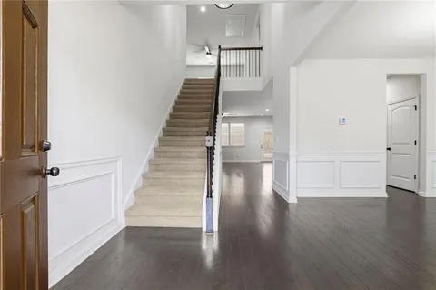 a view of entryway with wooden floor