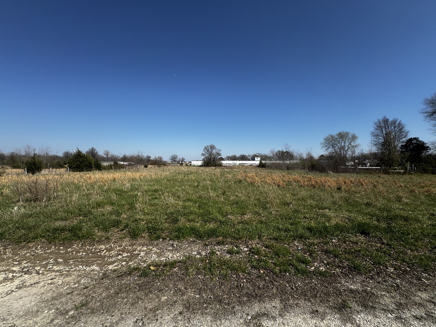 0 State Highway Pinckneyville, IL 62274 - Photo 2 of 3 a view of a lake with a building in the background
