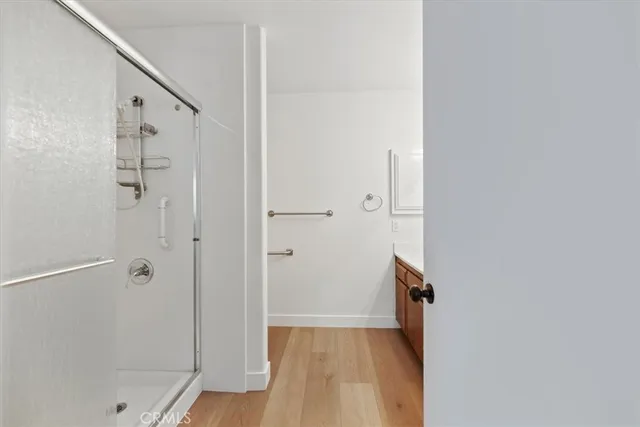 a bathroom with a bathtub and shower