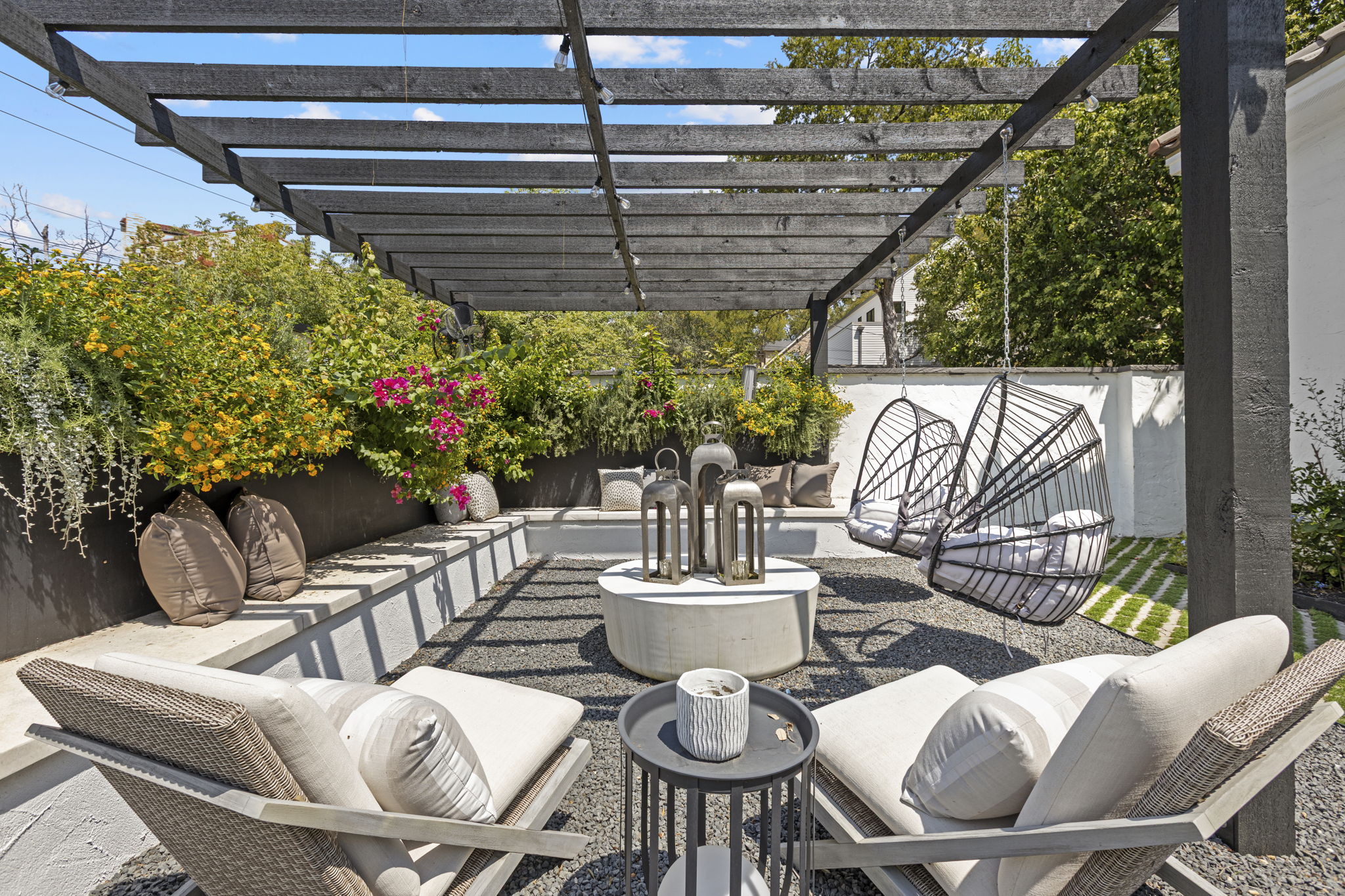 2621 Exposition Boulevard Austin, TX 78703 - Photo 4 of 30 Fenced backyard featuring an outdoor living space, a patio area, and a pergola