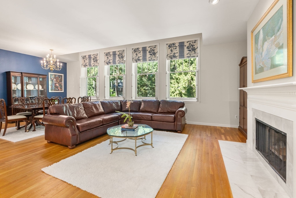 63 Garden Road, Unit G7 Wellesley, MA 02481 - Photo 3 of 22 a living room with furniture and a fireplace