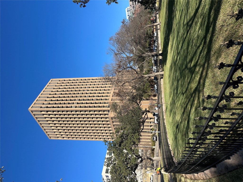 a front view of a building with outdoor space