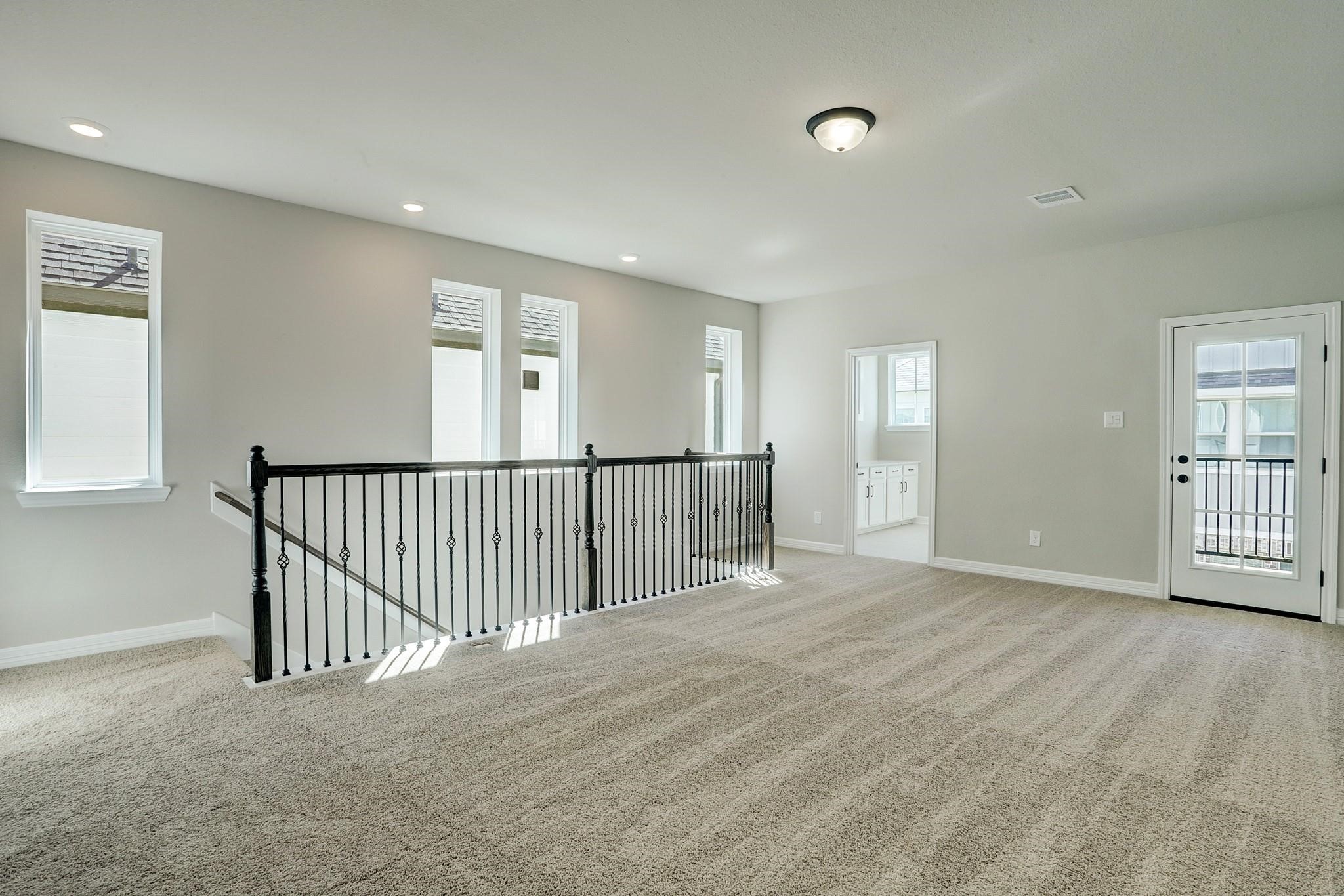 9522 Caddo Ridge Lane Cypress, TX 77433 - Photo 14 of 38 a view of an empty room with a window