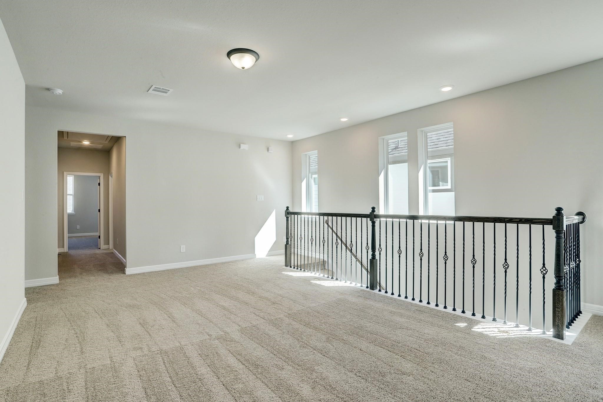 9522 Caddo Ridge Lane Cypress, TX 77433 - Photo 15 of 38 a view of a hallway