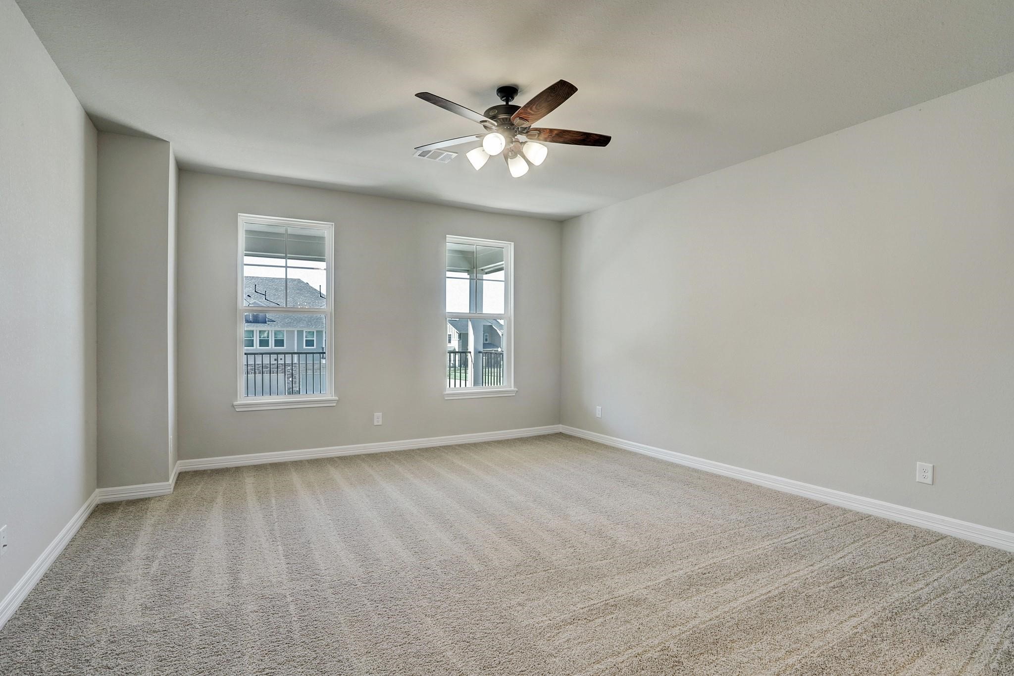 9522 Caddo Ridge Lane Cypress, TX 77433 - Photo 16 of 38 a view of an empty room with a window