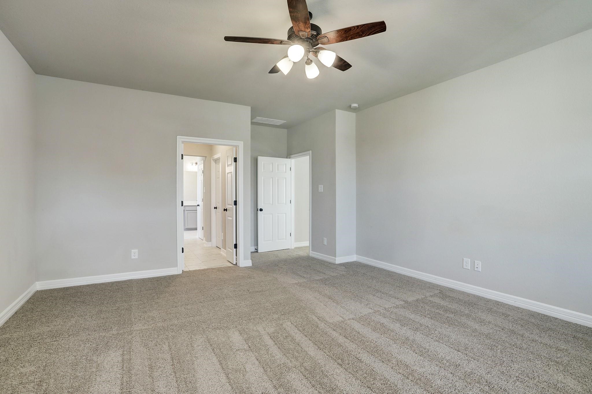 9522 Caddo Ridge Lane Cypress, TX 77433 - Photo 17 of 38 a view of an empty room
