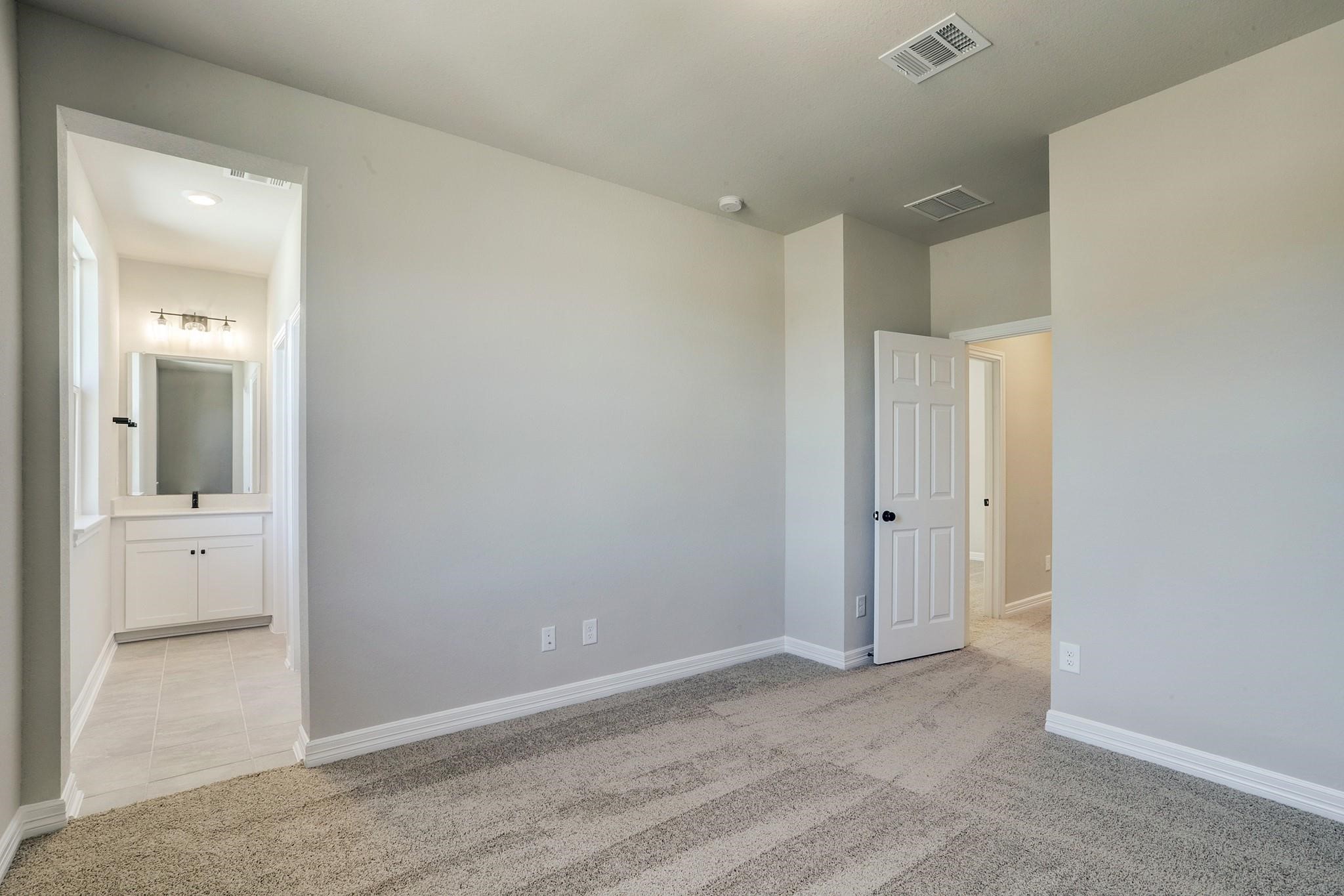 9522 Caddo Ridge Lane Cypress, TX 77433 - Photo 24 of 38 a view of an empty room