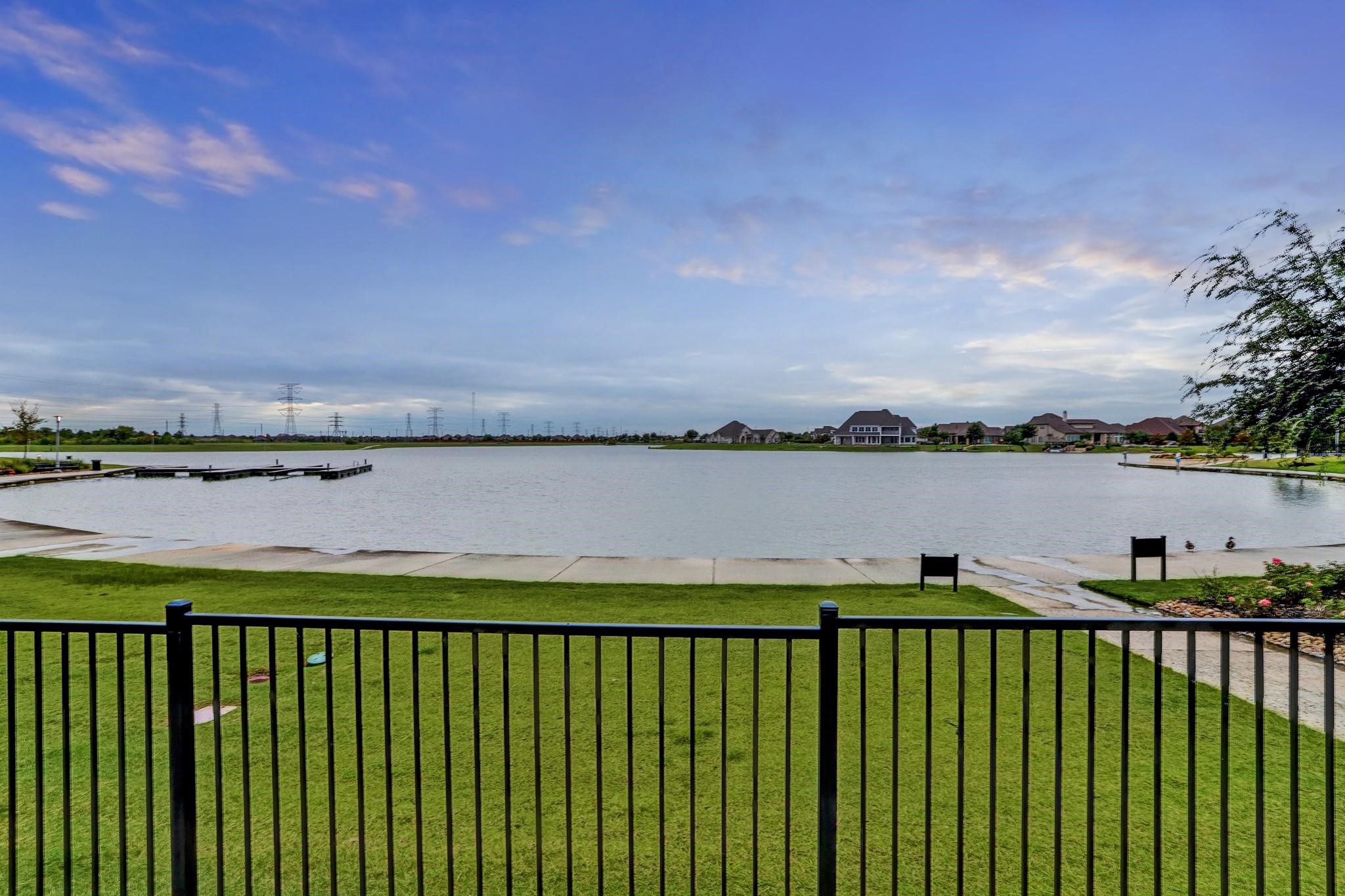9522 Caddo Ridge Lane Cypress, TX 77433 - Photo 33 of 38 a view of swimming pool and lake view