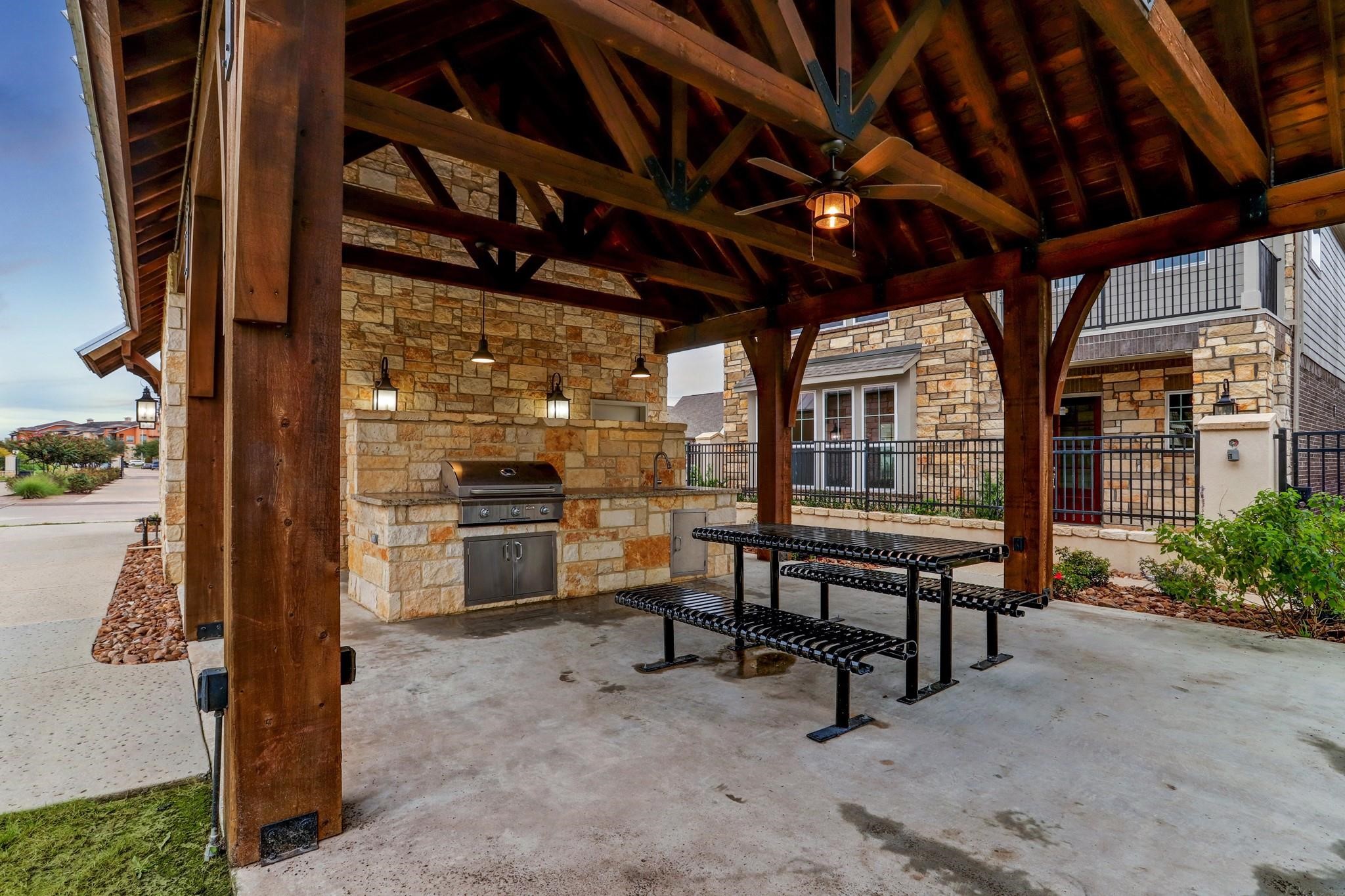 9522 Caddo Ridge Lane Cypress, TX 77433 - Photo 37 of 38 a view of a porch with furniture and a yard