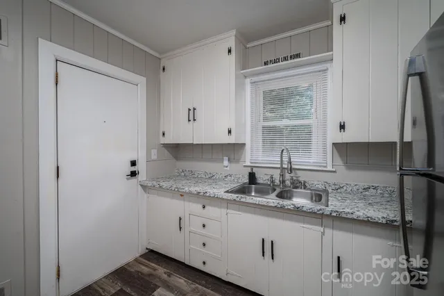 a kitchen with a stove and a microwave