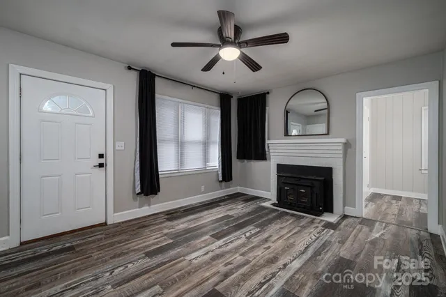wooden floor fireplace and natural light