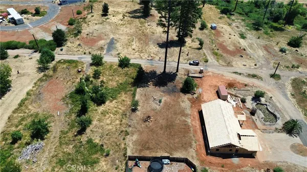 an aerial view of residential house with outdoor space