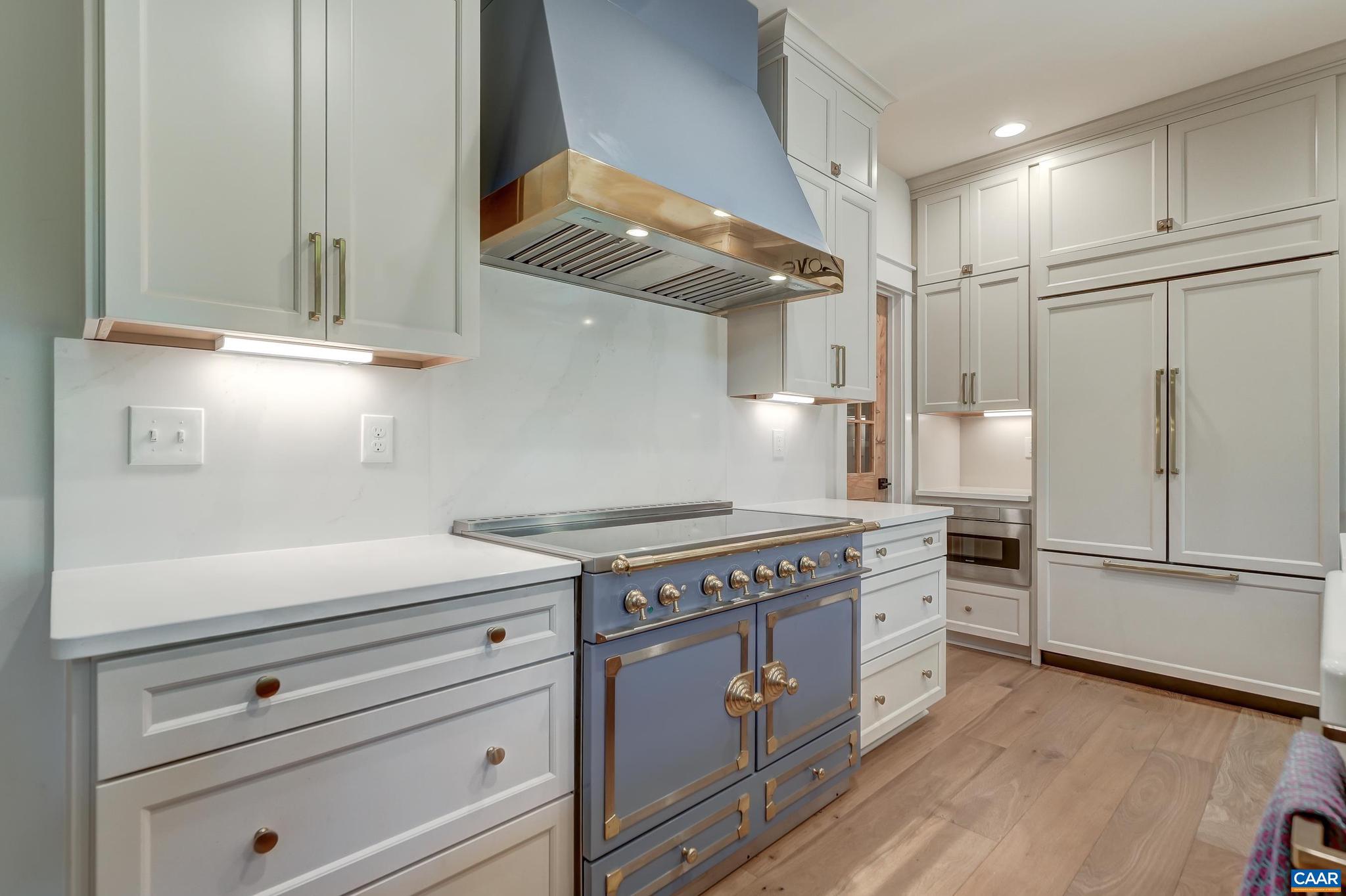 3327 Rowcross Street Crozet, VA 22932 - Photo 10 of 63 a kitchen with stainless steel appliances granite countertop a stove and a refrigerator