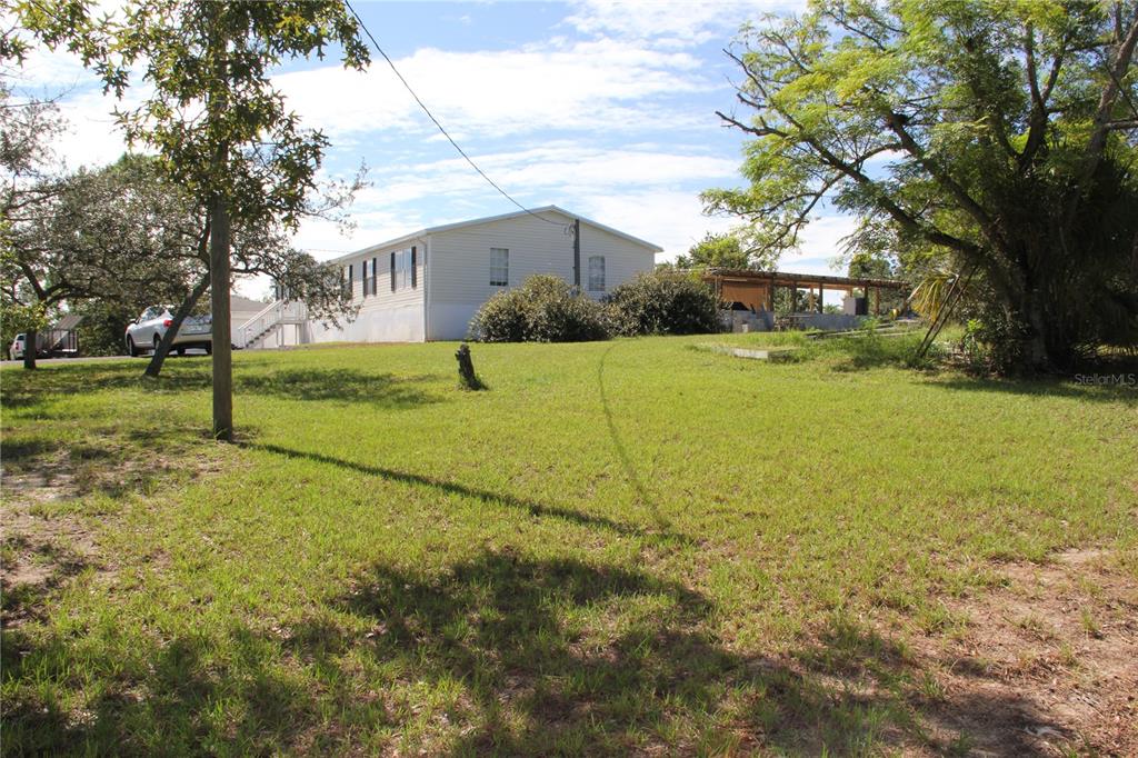 13127 Star Road Brooksville, FL 34613 - Photo 43 of 54 a view of a field with of trees