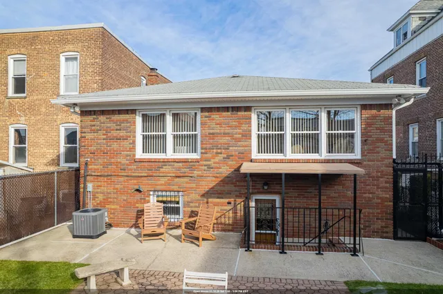 a front view of a house with glass windows