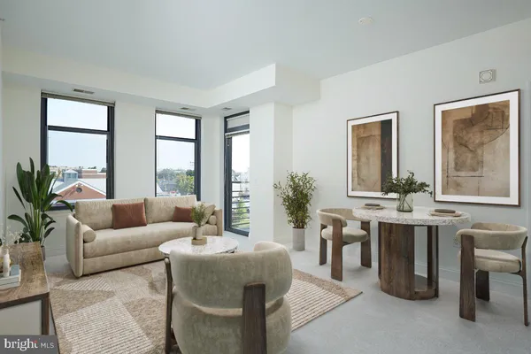 a kitchen with stainless steel appliances granite countertop a stove top oven a refrigerator a sink and dishwasher