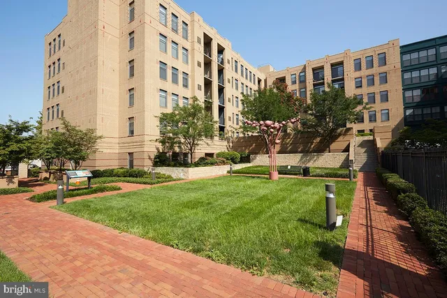 a view of a building with garden