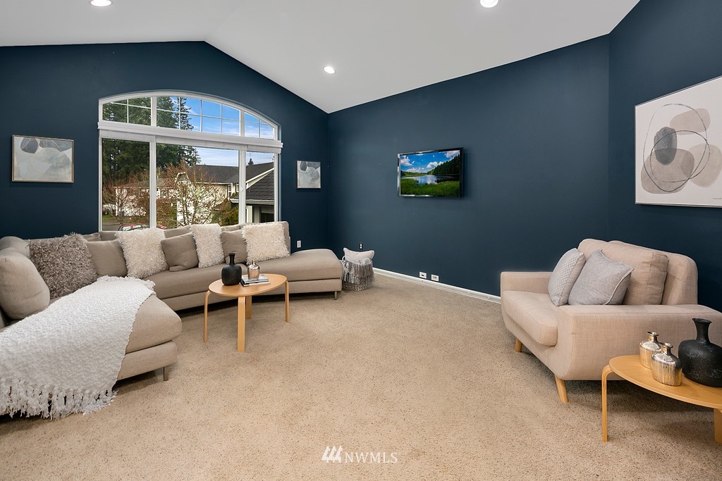 22214 151st Place Southeast Monroe, WA 98272 - Photo 15 of 28 a living room with furniture and a large window